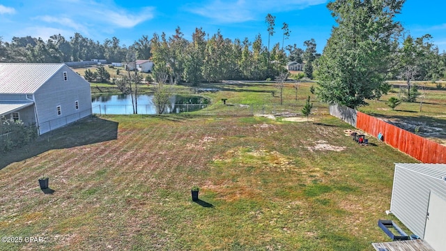 view of yard with a water view