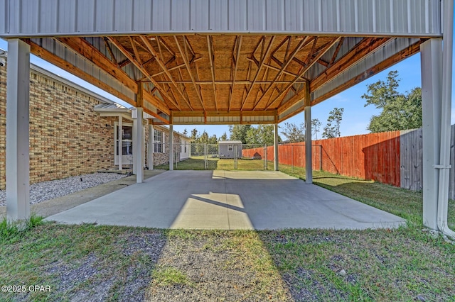 view of patio / terrace featuring a shed