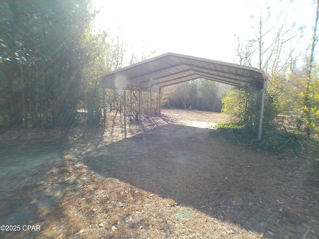 view of parking with a carport