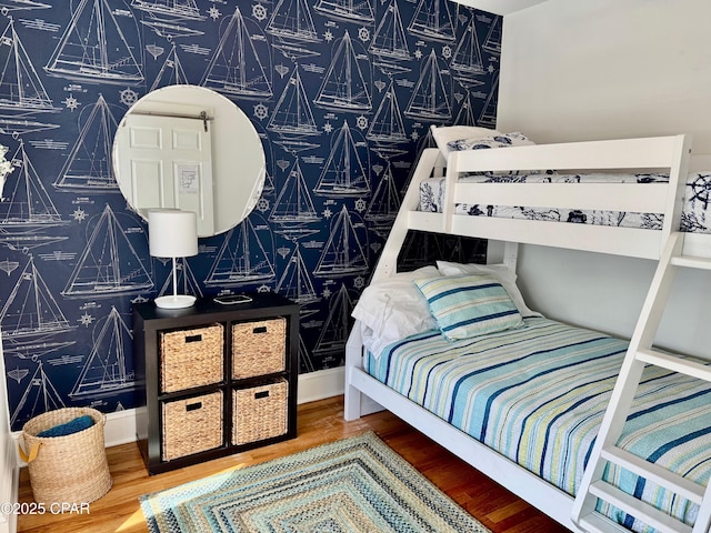 bedroom with wood finished floors