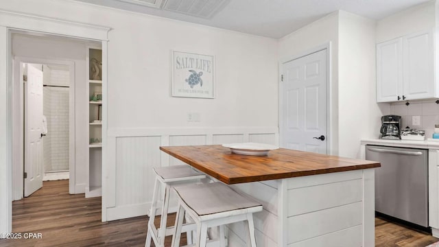 dining space featuring dark wood-type flooring