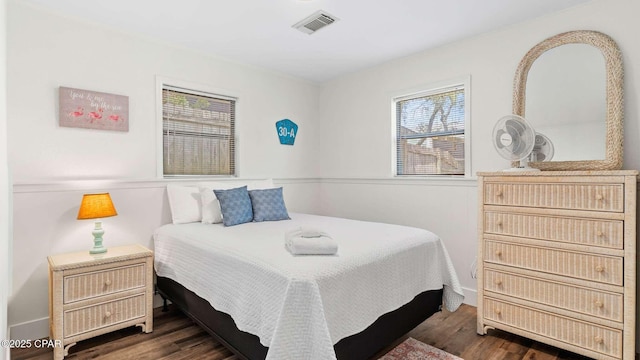 bedroom featuring dark hardwood / wood-style floors