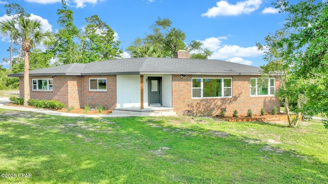 ranch-style house with a front lawn