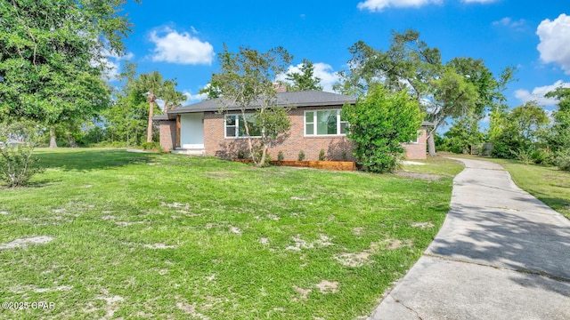 view of front of home with a front lawn