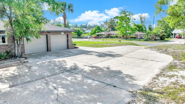 garage with a yard