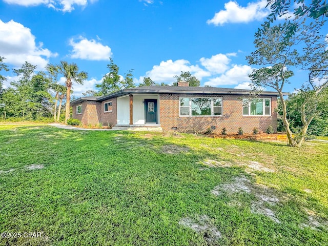 ranch-style home with a front yard