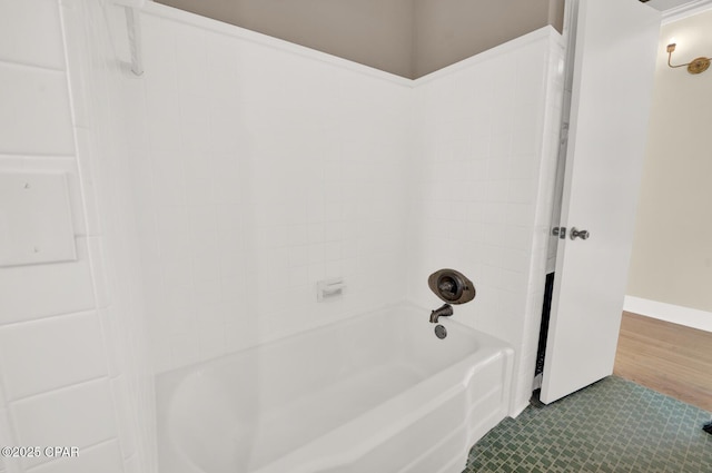 bathroom featuring washtub / shower combination