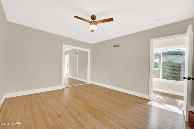 unfurnished bedroom featuring ceiling fan and light hardwood / wood-style flooring