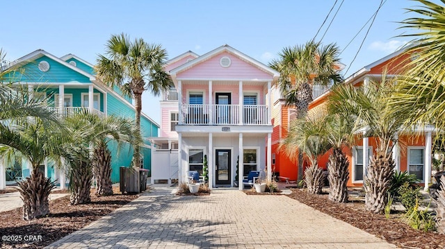 raised beach house with a balcony