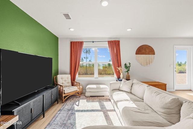 living room with light hardwood / wood-style floors