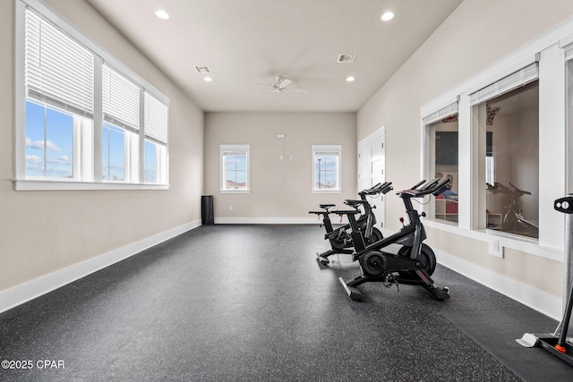 workout room featuring ceiling fan