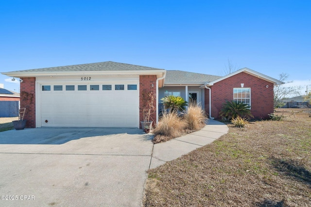 ranch-style home featuring a garage