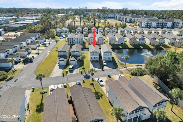 drone / aerial view with a water view