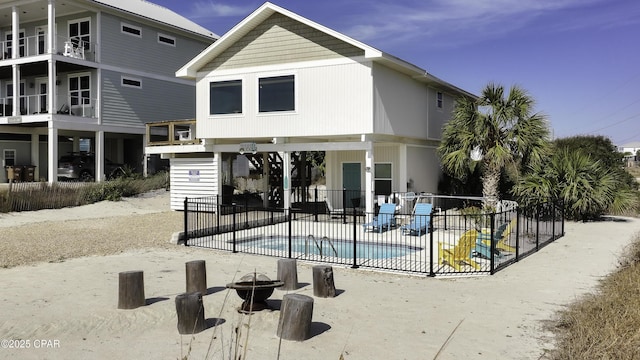 view of pool featuring fence, a fenced in pool, and a patio