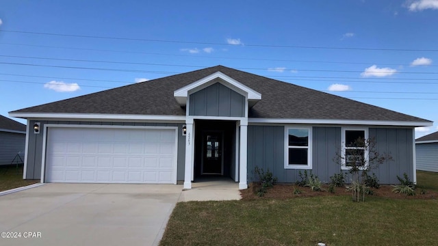 single story home featuring a garage, concrete driveway, a shingled roof, and board and batten siding