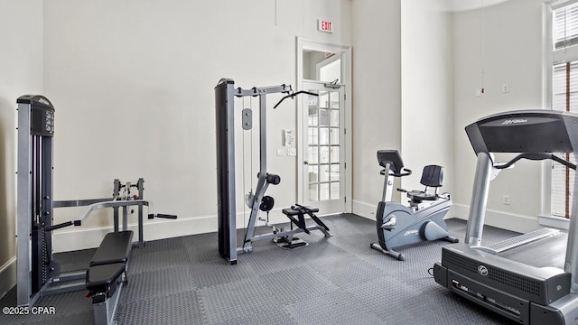 exercise room with baseboards