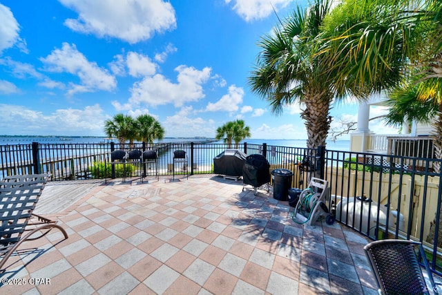 view of patio / terrace featuring a water view