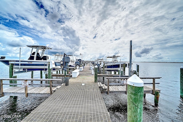 view of dock featuring a water view and boat lift