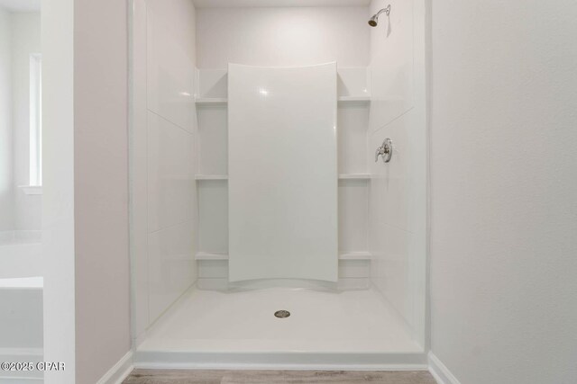 bathroom featuring walk in shower