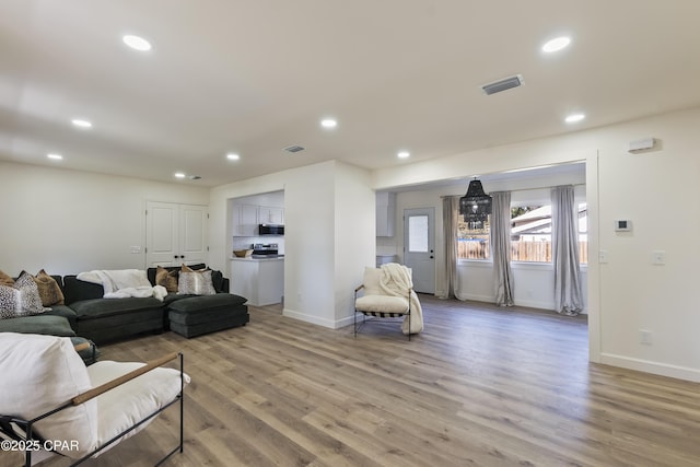 living room with light wood-type flooring