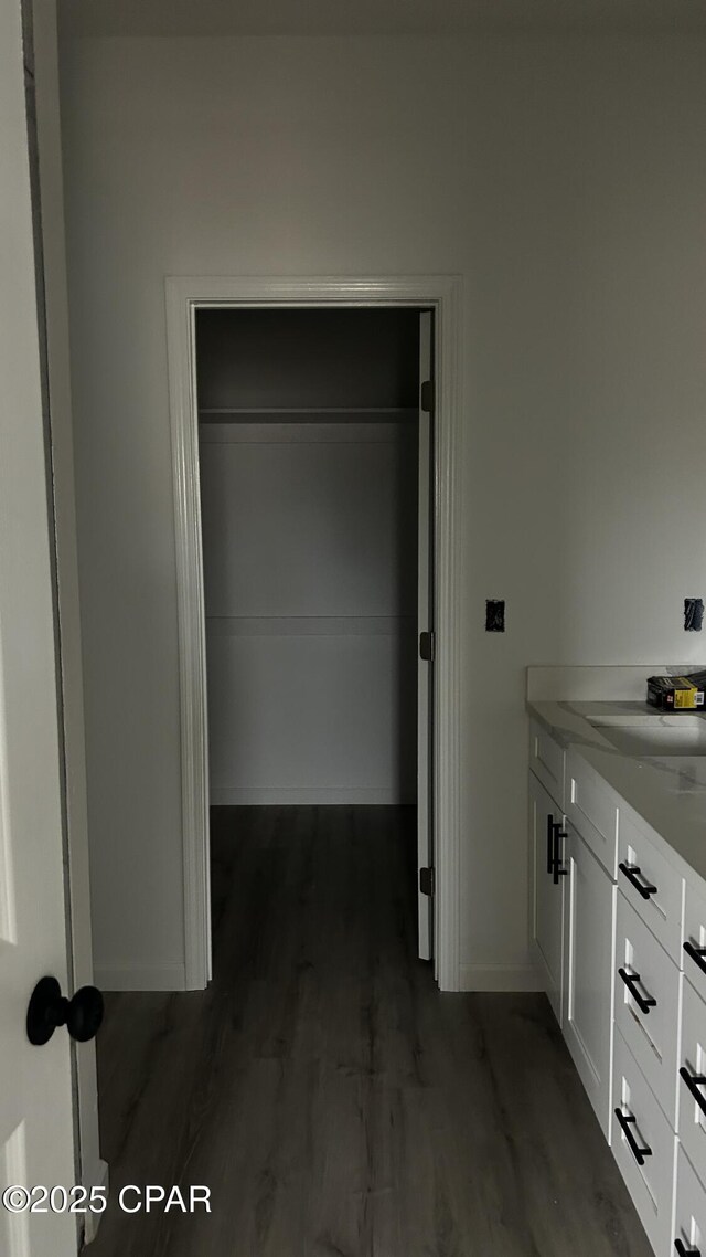 empty room with hardwood / wood-style flooring and ceiling fan