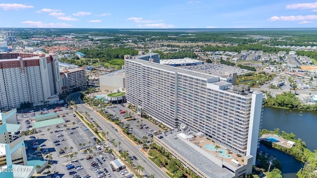 birds eye view of property featuring a view of city and a water view