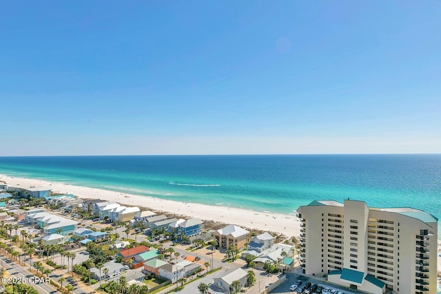 birds eye view of property featuring a residential view, a view of the beach, and a water view