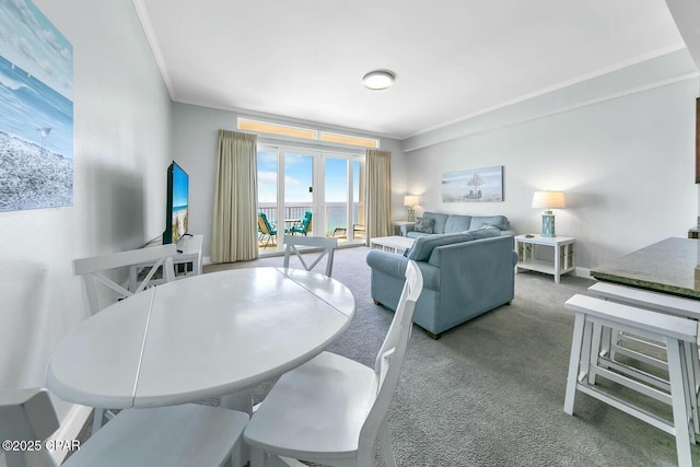 9860 S Thomas Dr Unit 2017, Panama City, FL 32408 - dining area featuring crown molding, carpet floors, and french doors
