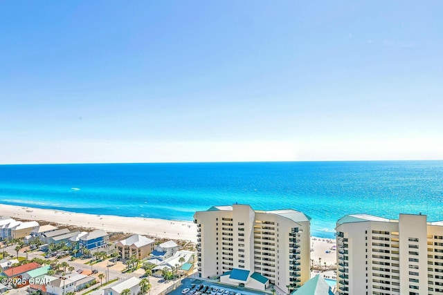 bird's eye view with a water view and a view of the beach