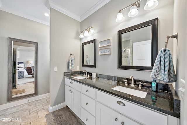 bathroom featuring vanity and ornamental molding