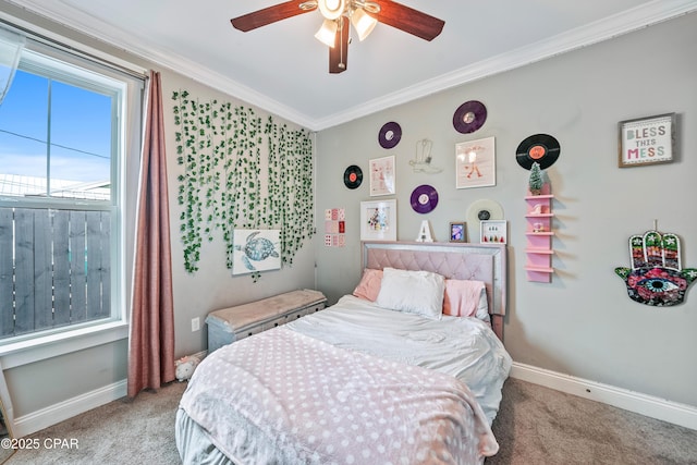 bedroom with ceiling fan, ornamental molding, and light carpet