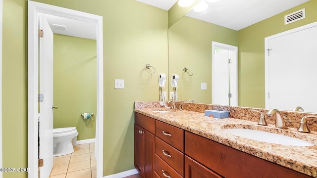 full bathroom featuring tile patterned floors, visible vents, a sink, and toilet