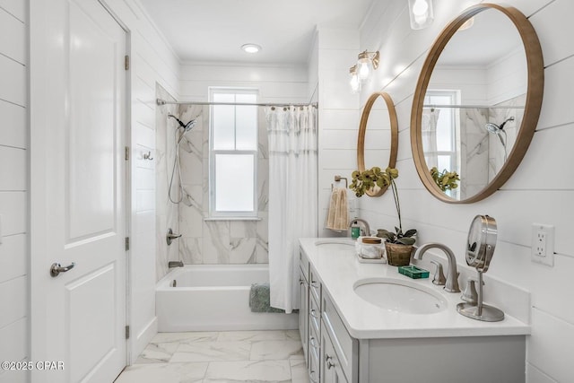 bathroom featuring vanity, ornamental molding, and shower / tub combo