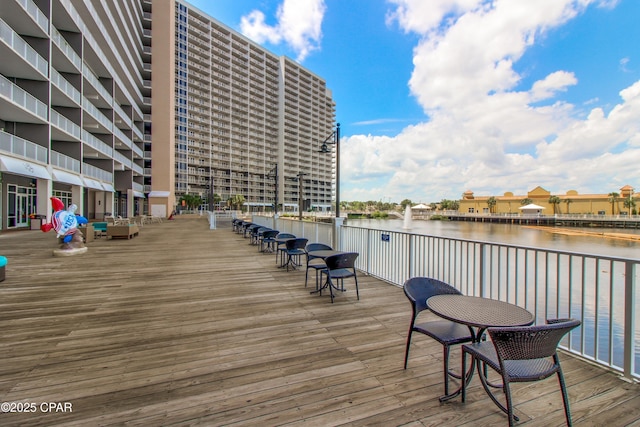 wooden terrace with a water view