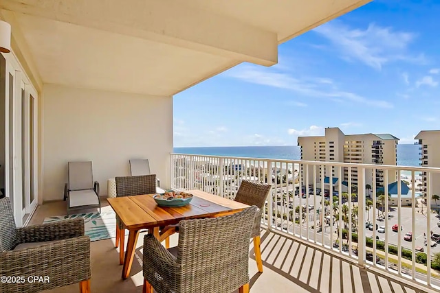 balcony featuring a water view