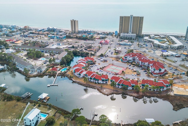 birds eye view of property featuring a water view