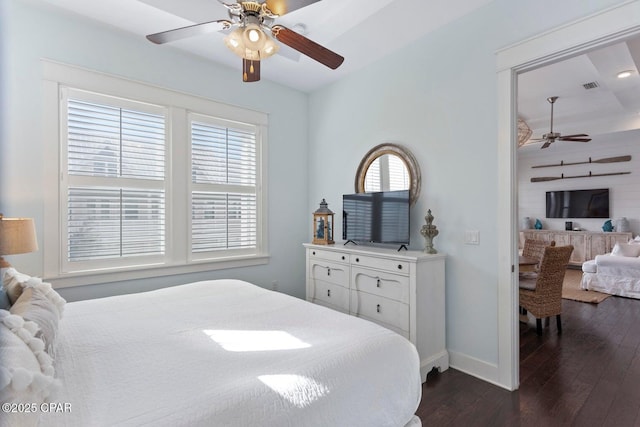 bedroom with dark wood-type flooring