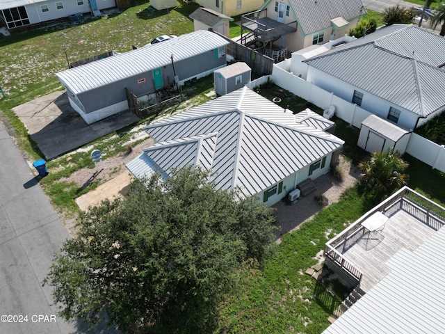 birds eye view of property with a residential view