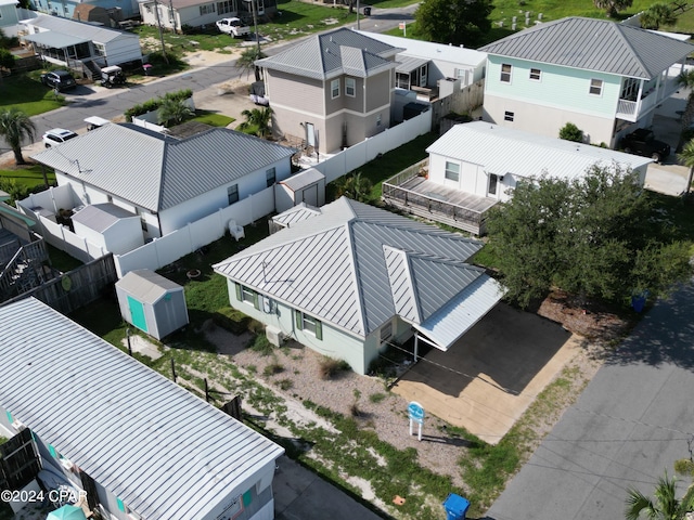 birds eye view of property with a residential view