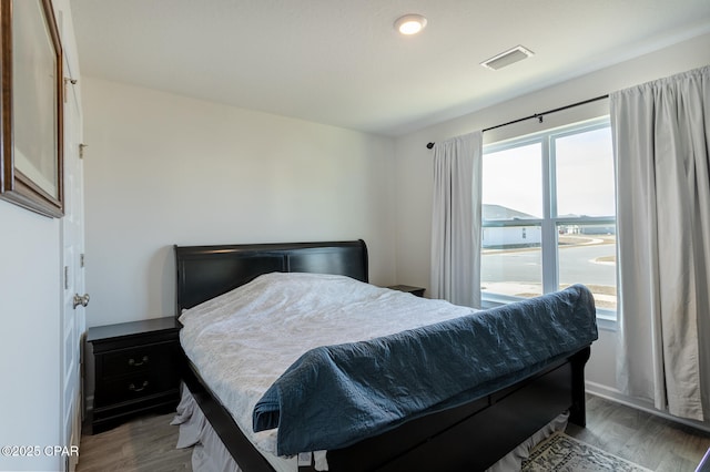 bedroom featuring hardwood / wood-style floors