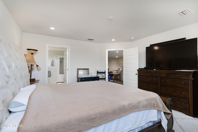 bedroom with connected bathroom