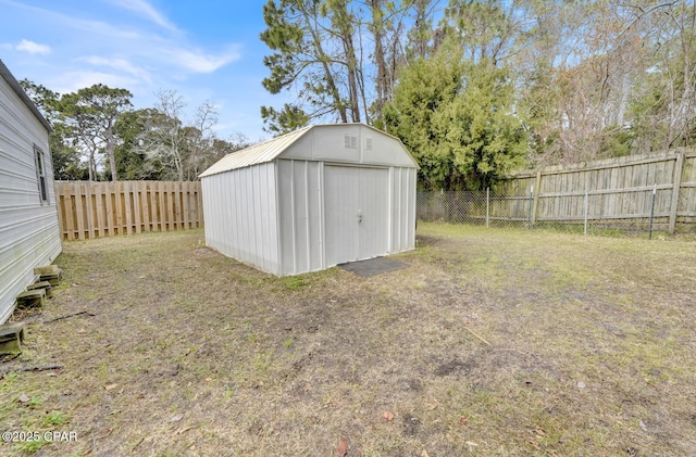 view of outbuilding with a yard