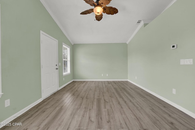 unfurnished living room featuring crown molding, ceiling fan, and light hardwood / wood-style floors