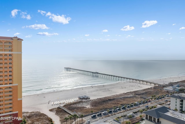 exterior space featuring a view of the beach and a water view