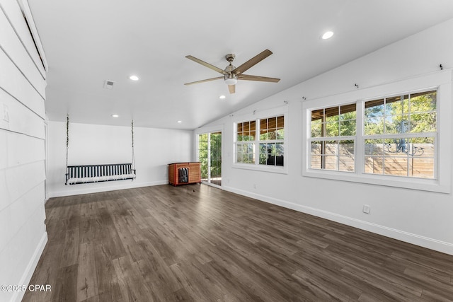 unfurnished living room featuring ceiling fan, lofted ceiling, and dark hardwood / wood-style flooring