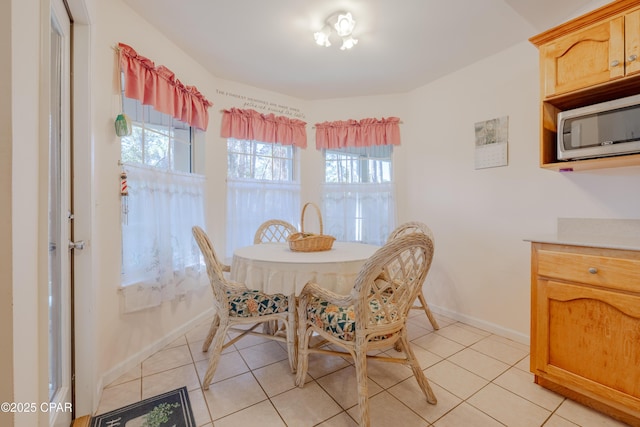 view of tiled dining space