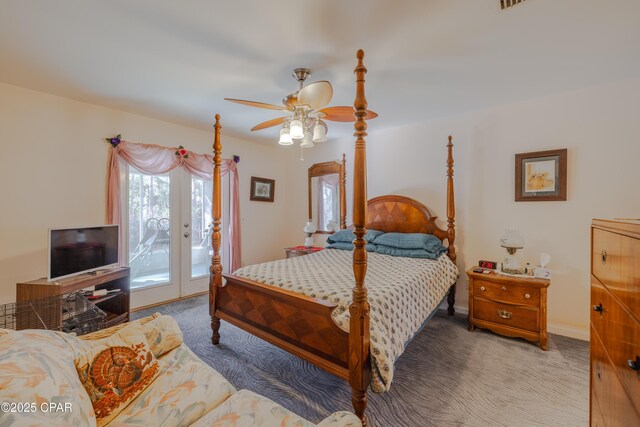 carpeted bedroom featuring access to exterior and french doors