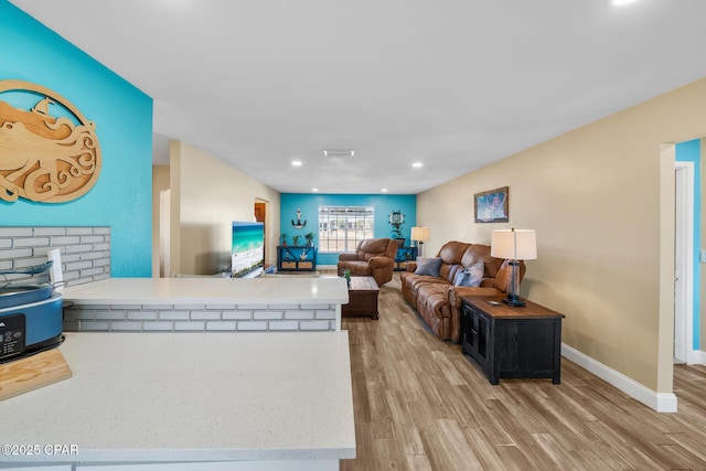 living room with light hardwood / wood-style floors