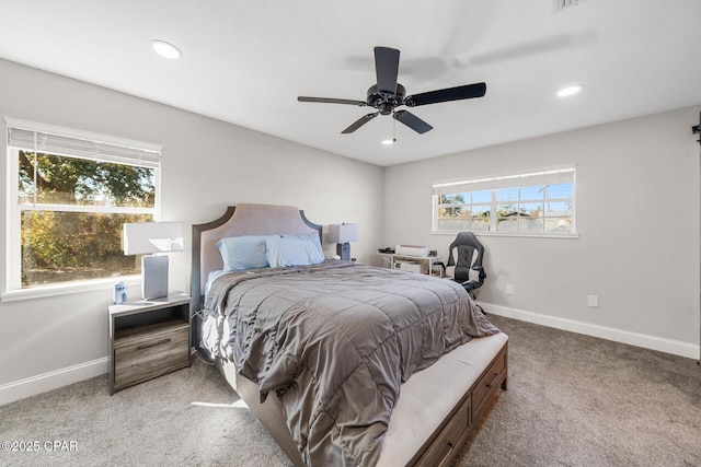 carpeted bedroom with ceiling fan