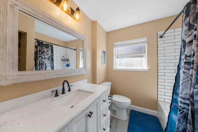 full bathroom featuring vanity, toilet, and shower / bathtub combination with curtain